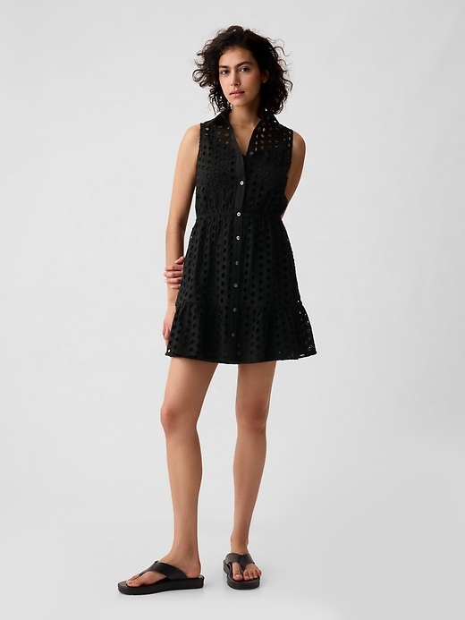 1 of 8 showing, with the color black of product Eyelet Tiered Mini Dress
