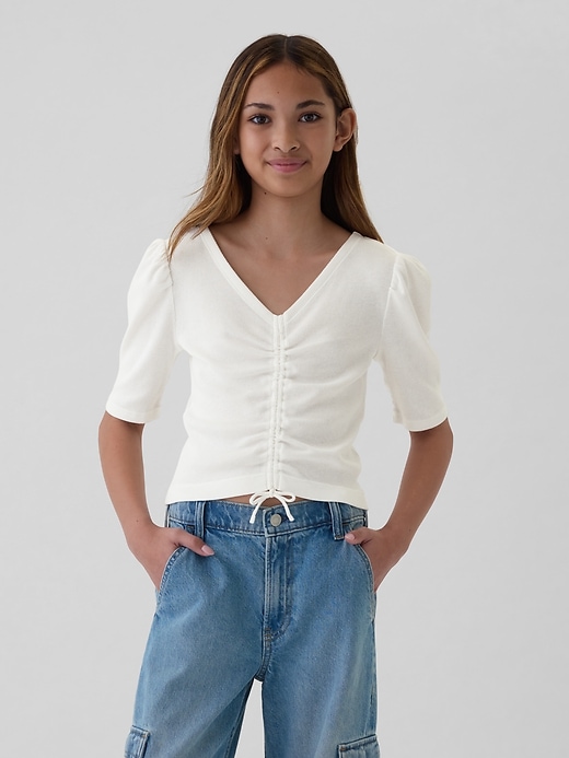 1 of 8 showing, with the color new off white of product Kids Essential Rib Ruched Shirt