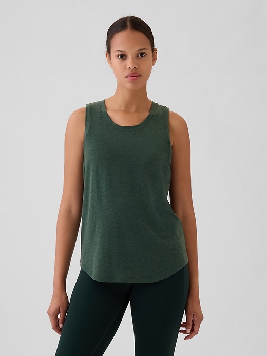 1 of 8 showing, with the color essex green of product GapFit Muscle Tank Top
