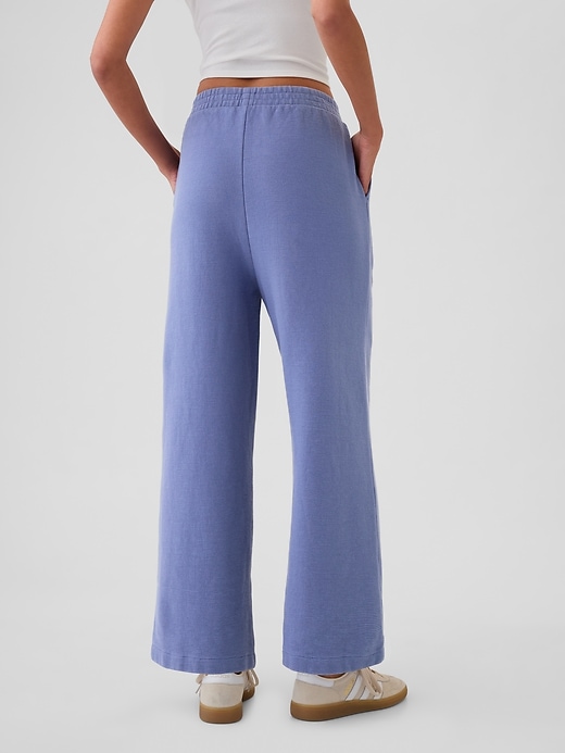 2 of 8 showing, with the color larkspur blue of product Textured Wide-Leg Ankle Sweatpants