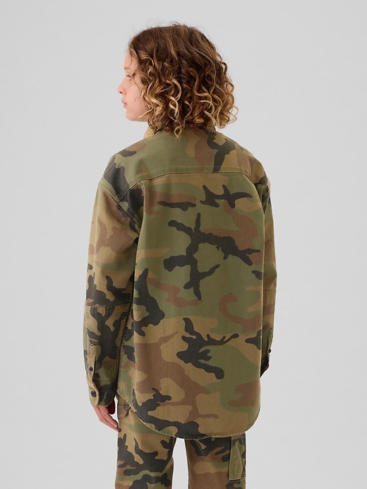 2 of 8 showing, with the color green camo of product Kids Camo Utility Shirt
