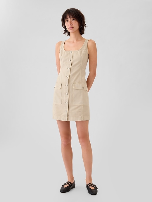 1 of 8 showing, with the color bedrock beige of product Utility Button Mini Dress