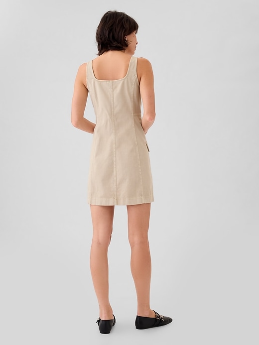 2 of 8 showing, with the color bedrock beige of product Utility Button Mini Dress