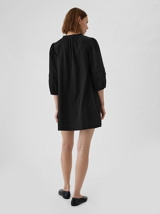2 of 8 showing, with the color black of product Eyelet Mini Dress