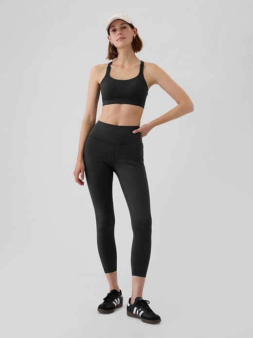 1 of 8 showing, with the color true black of product GapFit Power High Impact Racerback Sports Bra