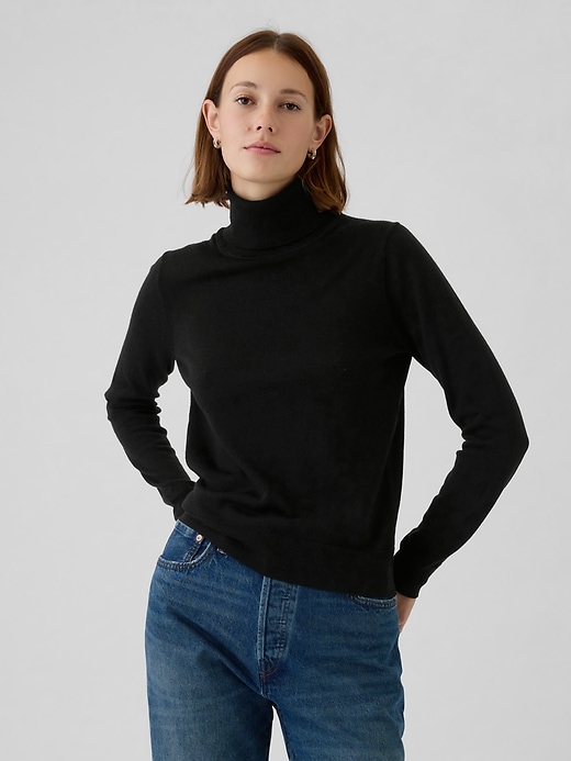 1 of 8 showing, with the color black of product Merino Turtleneck Sweater