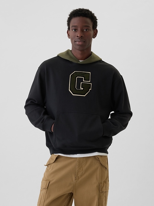 1 of 8 showing, with the color OLIVE NIGHT of product Heavyweight Colorblock Varsity Logo Hoodie
