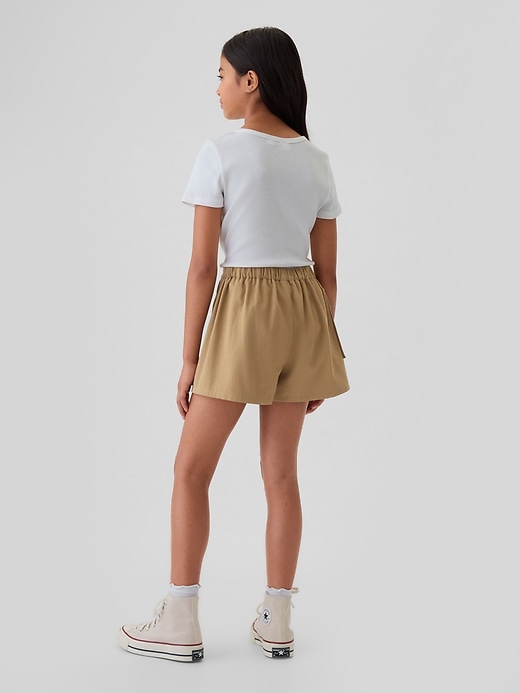 2 of 8 showing, with the color brown mojave of product Kids Utility Wrap Skort
