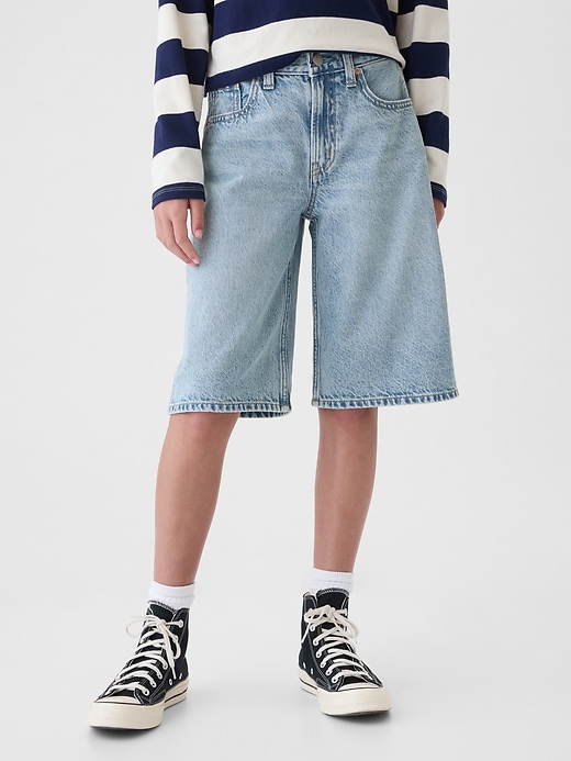 2 of 8 showing, with the color medium wash of product Kids Mid Rise Longline Denim Shorts