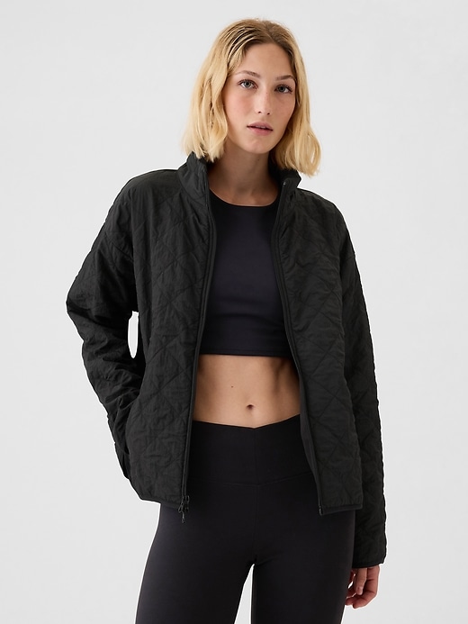 1 of 8 showing, with the color TRUE BLACK of product GapFit Quilted Jacket