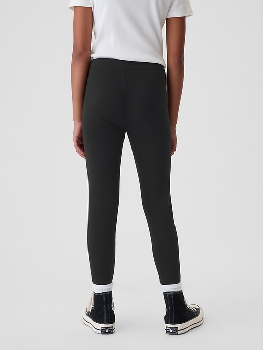 2 of 8 showing, with the color True black of product Kids Cozy Leggings
