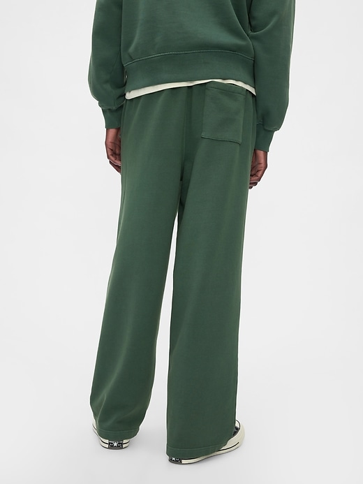 3 of 8 showing, with the color essex green of product Gap × Disney Logo Baggy Sweatpants