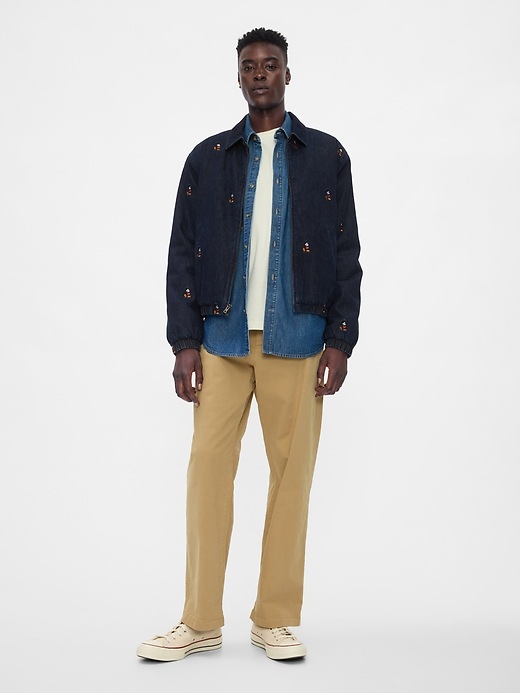 3 of 8 showing, with the color dark wash of product Gap × Disney Embroidered Denim Bomber Jacket