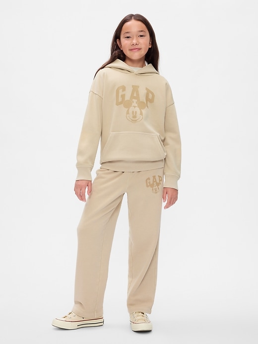 5 of 8 showing, with the color bedrock beige of product Gap × Disney Kids VintageSoft Mickey Mouse Logo Sweatpants