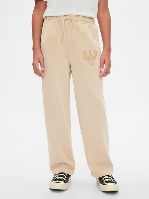 3 of 8 showing, with the color bedrock beige of product Gap × Disney Kids VintageSoft Mickey Mouse Logo Sweatpants