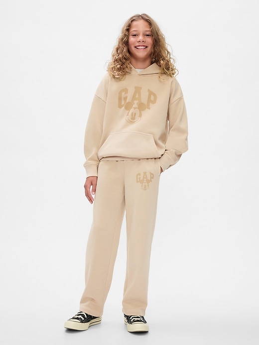 1 of 8 showing, with the color bedrock beige of product Gap × Disney Kids VintageSoft Mickey Mouse Logo Sweatpants