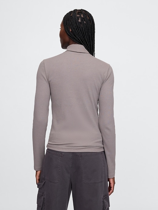 2 of 8 showing, with the color plymouth rock brown of product Modern Rib Turtleneck