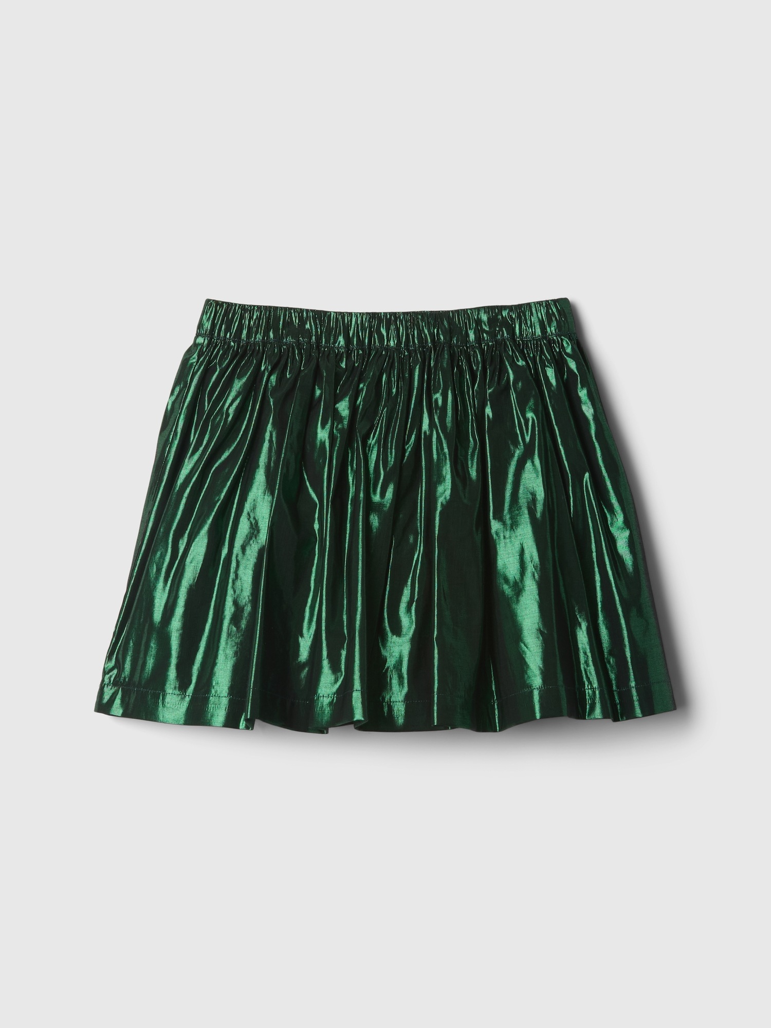 Metallic pleated skirt gap clearance