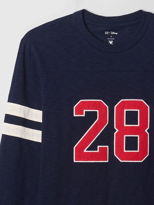6 of 8 showing, with the color navy uniform of product Gap × Disney Varsity Jersey T-Shirt
