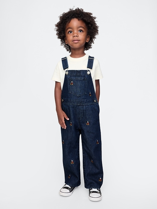 1 of 8 showing, with the color dark wash of product Gap × Disney Baby Mickey Mouse Embroidered Denim Overalls
