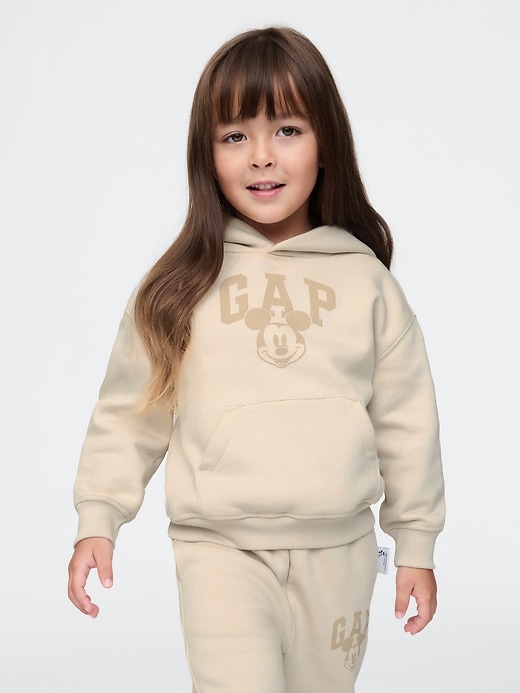 5 of 8 showing, with the color bedrock beige of product Gap × Disney Baby Vintage Soft Mickey Mouse Logo Hoodie