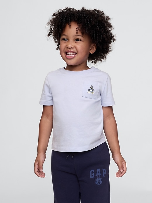 5 of 8 showing, with the color Donald Duck jet stream blue of product Gap × Disney Baby Pocket T-Shirt