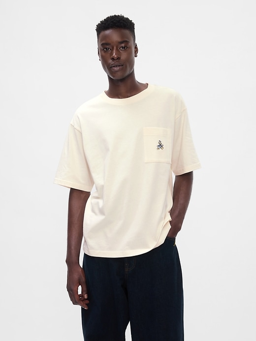 1 of 8 showing, with the color Donald Duck ivory frost of product Gap × Disney Heavyweight Pocket T-Shirt