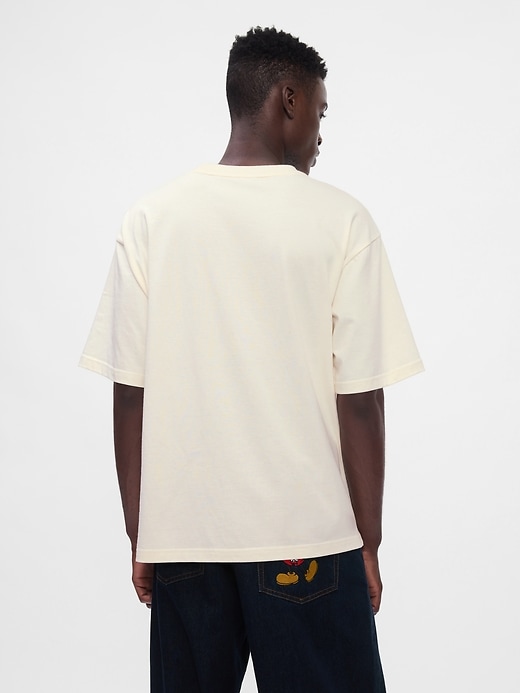 2 of 8 showing, with the color Donald Duck ivory frost of product Gap × Disney Heavyweight Pocket T-Shirt