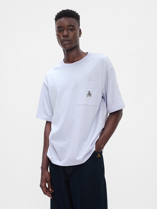 1 of 8 showing, with the color Donald Duck jet stream blue of product Gap × Disney Heavyweight Pocket T-Shirt