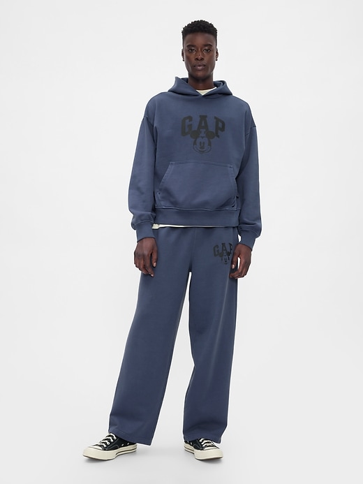 1 of 8 showing, with the color navy uniform of product Gap × Disney Logo Baggy Sweatpants