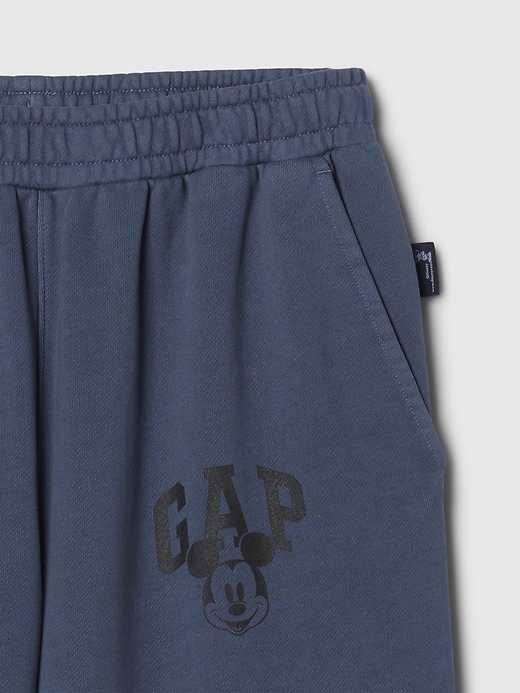 6 of 8 showing, with the color navy uniform of product Gap × Disney Logo Baggy Sweatpants