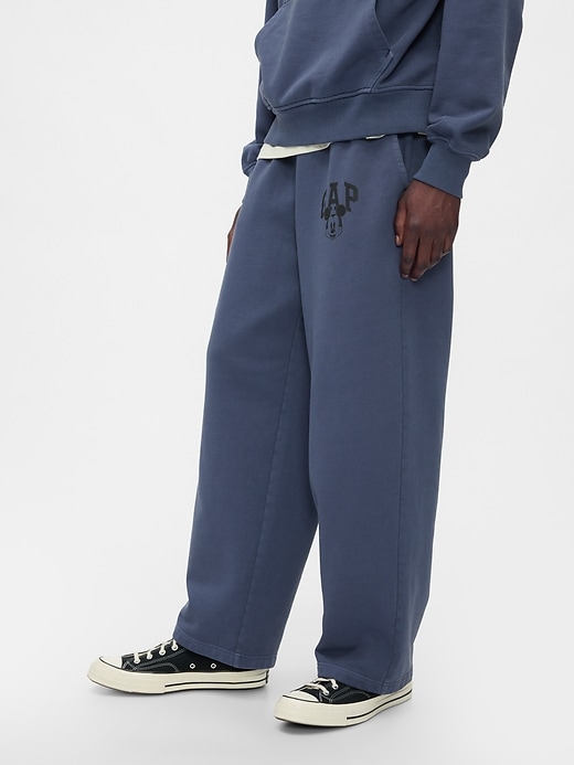 4 of 8 showing, with the color navy uniform of product Gap × Disney Logo Baggy Sweatpants