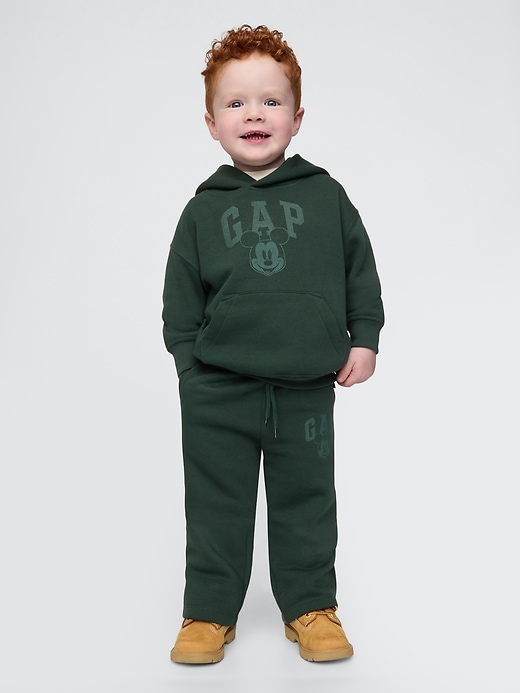 1 of 8 showing, with the color essex green of product Gap × Disney Baby Vintage Soft Mickey Mouse Logo Sweatpants