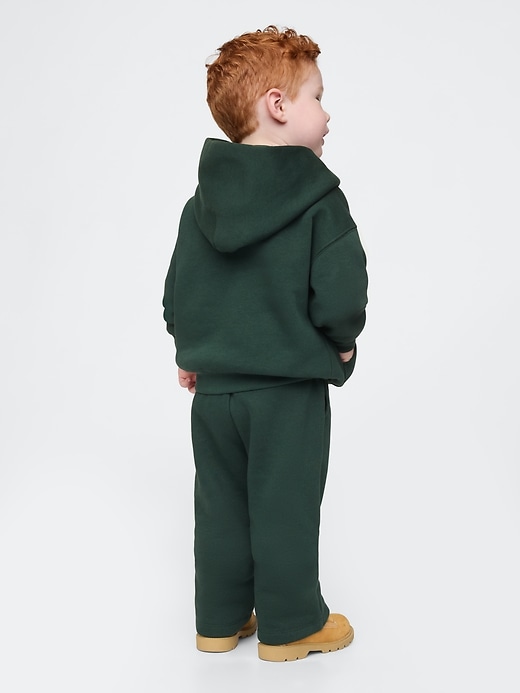 2 of 8 showing, with the color essex green of product Gap × Disney Baby Vintage Soft Mickey Mouse Logo Sweatpants