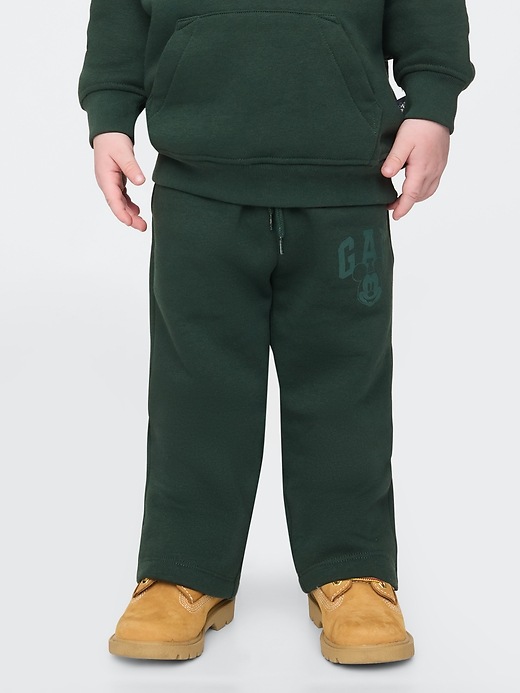 3 of 8 showing, with the color essex green of product Gap × Disney Baby Vintage Soft Mickey Mouse Logo Sweatpants