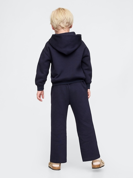 2 of 8 showing, with the color navy uniform of product Gap × Disney Baby Vintage Soft Mickey Mouse Logo Sweatpants