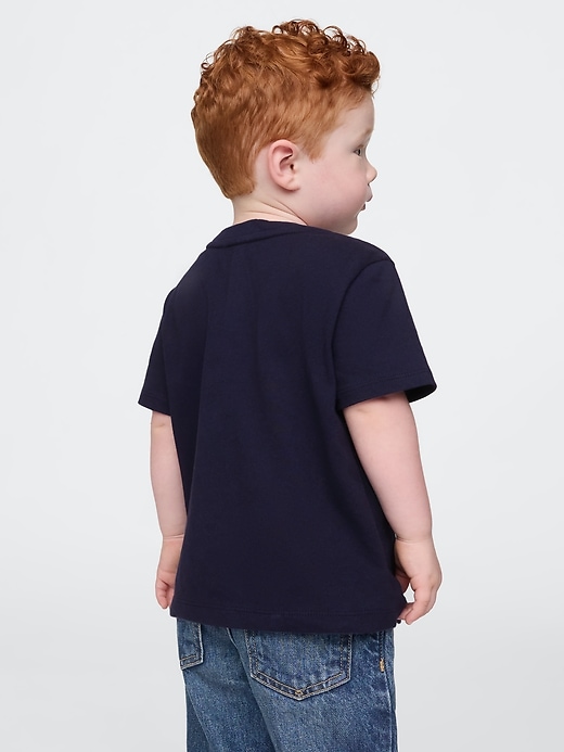 2 of 8 showing, with the color Mickey Mouse navy uniform of product Gap × Disney Baby Pocket T-Shirt