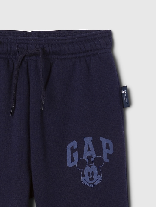4 of 8 showing, with the color navy uniform of product Gap × Disney Baby Vintage Soft Mickey Mouse Logo Sweatpants