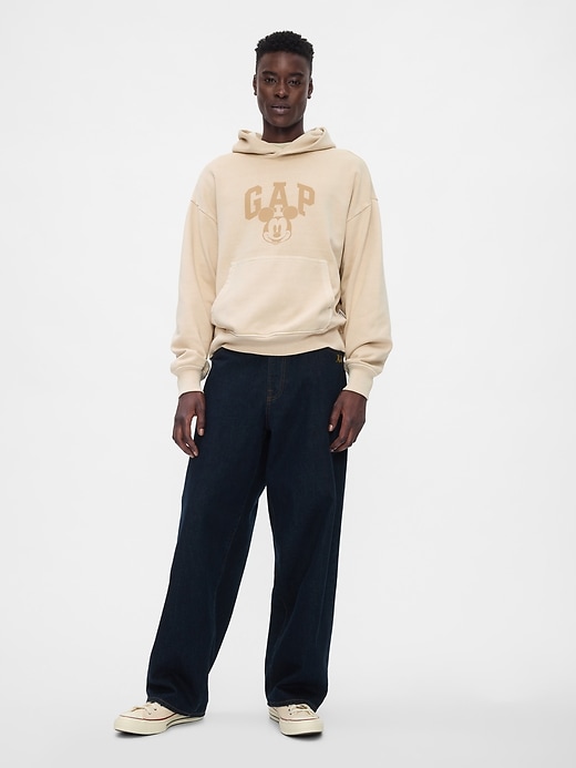 3 of 8 showing, with the color bedrock beige of product Gap × Disney Mickey Mouse Logo Hoodie