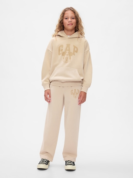 3 of 8 showing, with the color bedrock beige of product Gap × Disney Kids VintageSoft Mickey Mouse Logo Hoodie