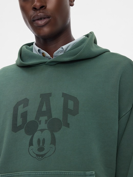 6 of 8 showing, with the color essex green of product Gap × Disney Mickey Mouse Logo Hoodie