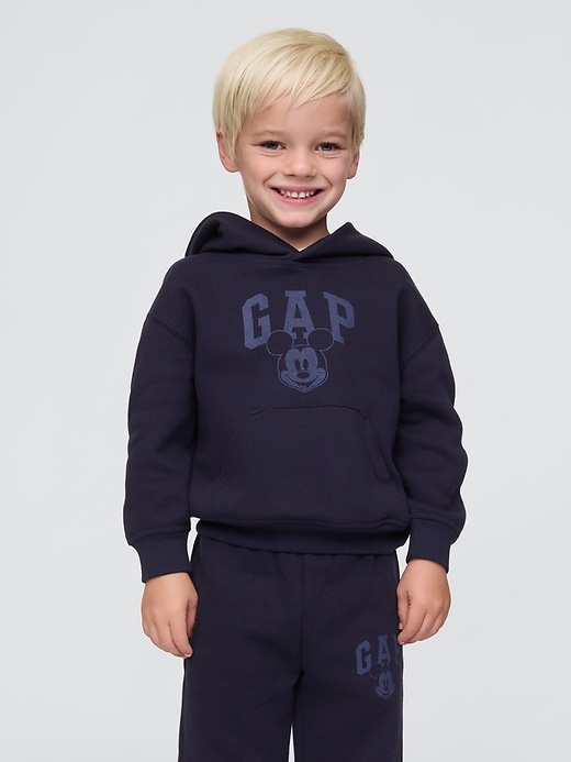 1 of 8 showing, with the color navy uniform of product Gap × Disney Baby Vintage Soft Mickey Mouse Logo Hoodie