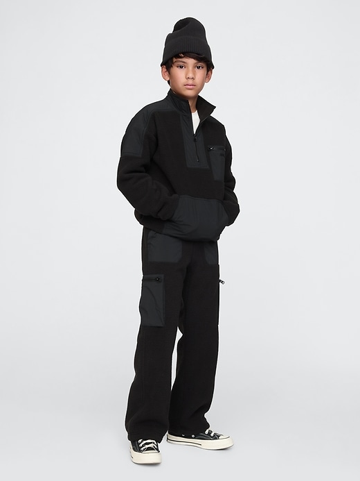 1 of 8 showing, with the color black of product Kids Sherpa Baggy Pants