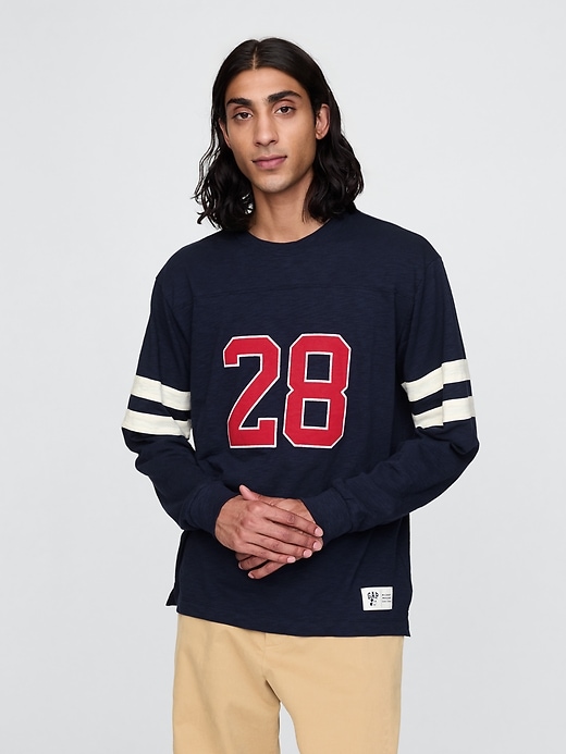 1 of 8 showing, with the color navy uniform of product Gap × Disney Varsity Jersey T-Shirt