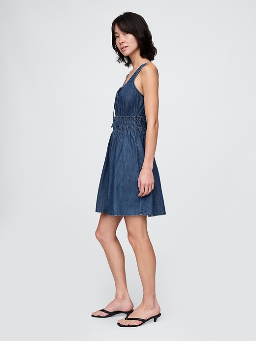Image number 3 showing, Denim Tie-Front Smocked Waist Mini Dress