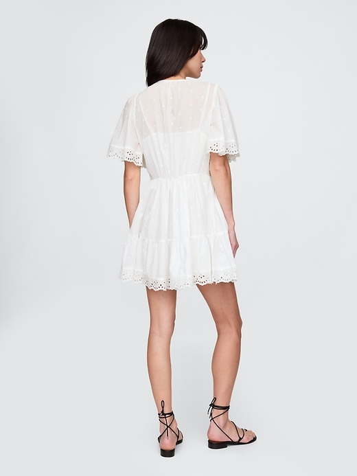 Image number 2 showing, Flutter-Sleeve Eyelet Mini Dress