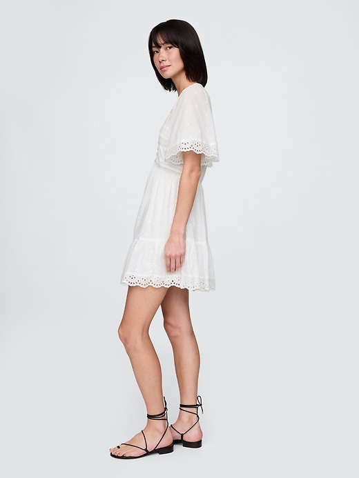 Image number 3 showing, Flutter-Sleeve Eyelet Mini Dress