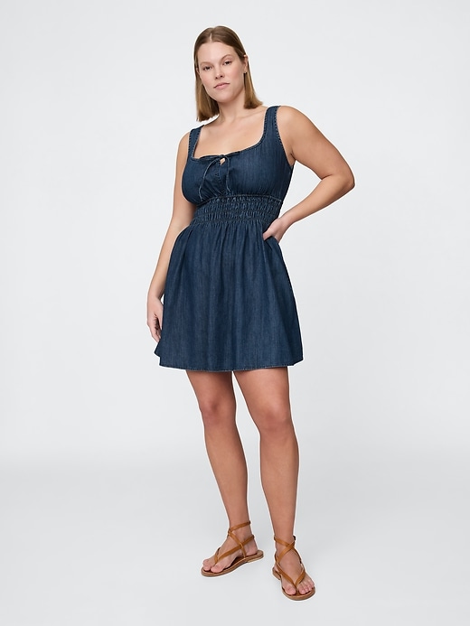 Image number 5 showing, Denim Tie-Front Smocked Waist Mini Dress