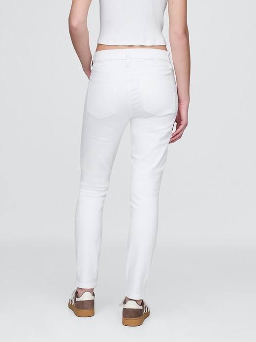 Image number 5 showing, Mid Rise True Skinny Jeans
