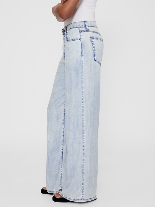 3 of 8 showing, with the color Light indigo of product GapStudio Mid Rise Draped Denim Baggy Jeans